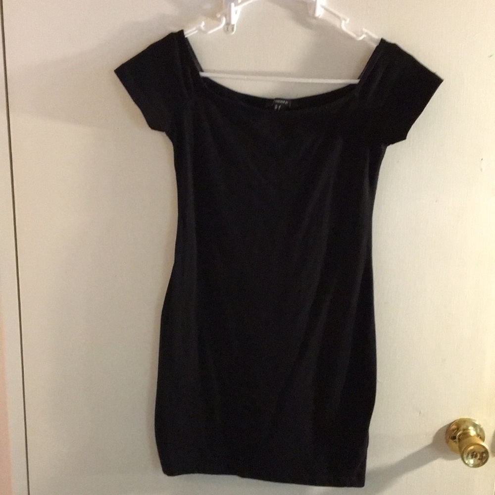 Woman’s simple black dress